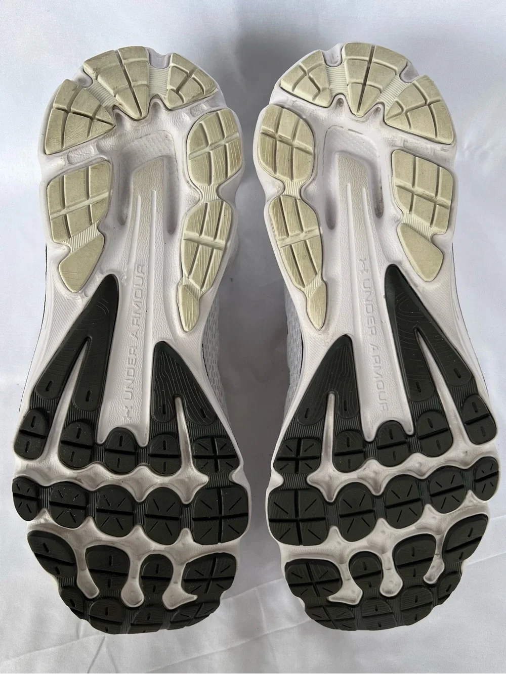 Under Armour (UA Charged Gemini) Mens White and Black Athletic Sneakers